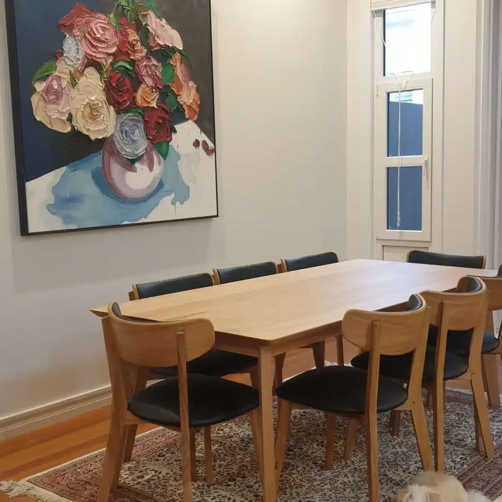 Custom Messmate Taper dining table with matching Oslo chairs in a Glenlyon-area home