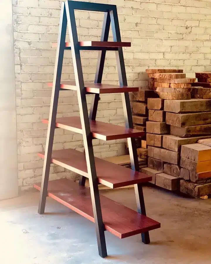Custom Jarrah ladder bookcase with a black timber frame for a Daylesford runner collection